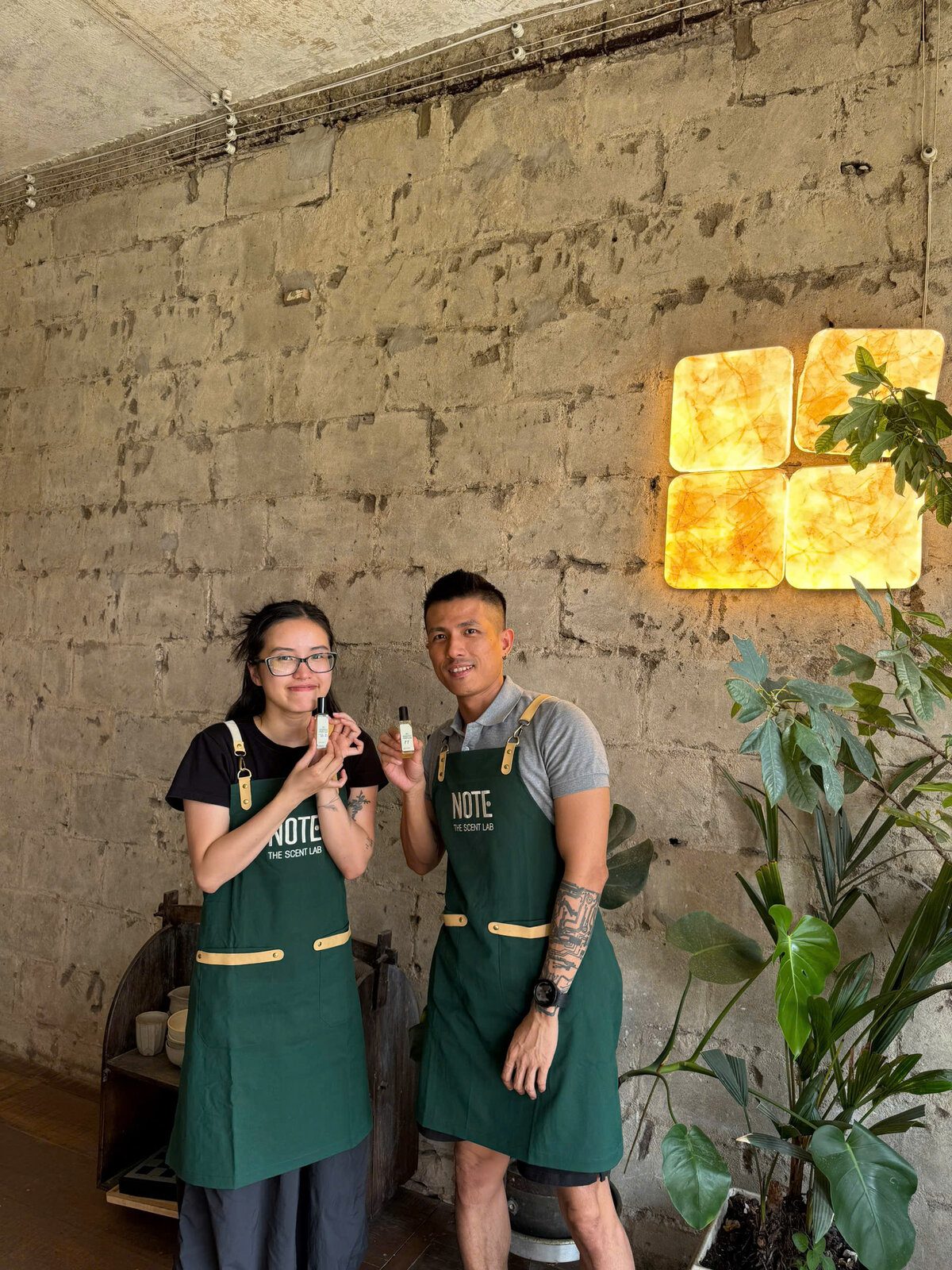 Happy travelers with custom perfume bottles